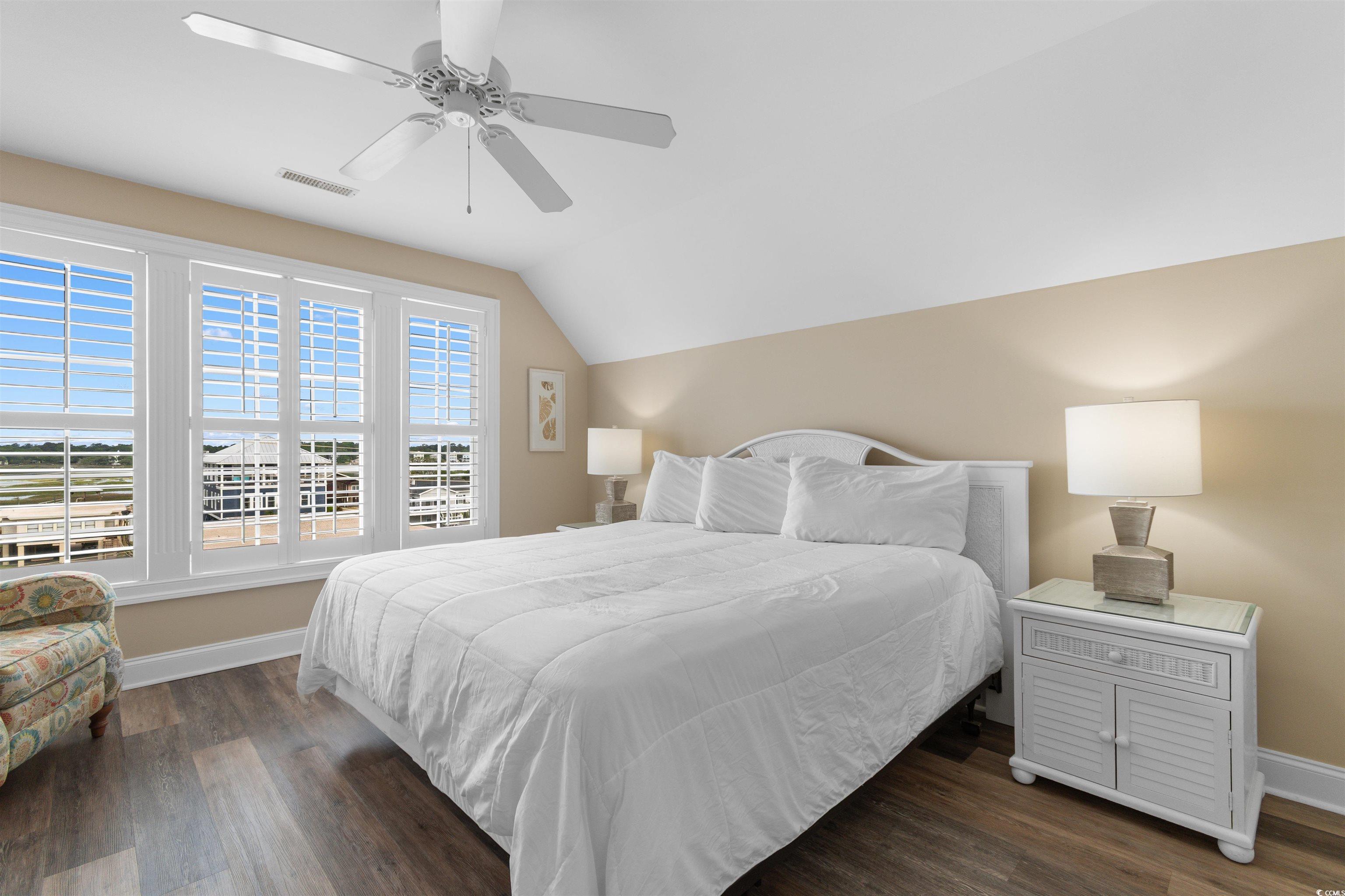 703 South Waccamaw Drive Murrells Inlet, SC 29576 - Photo 28 of 40 Inlet View Bedroom featuring a vaulted ceiling, and ceiling fan