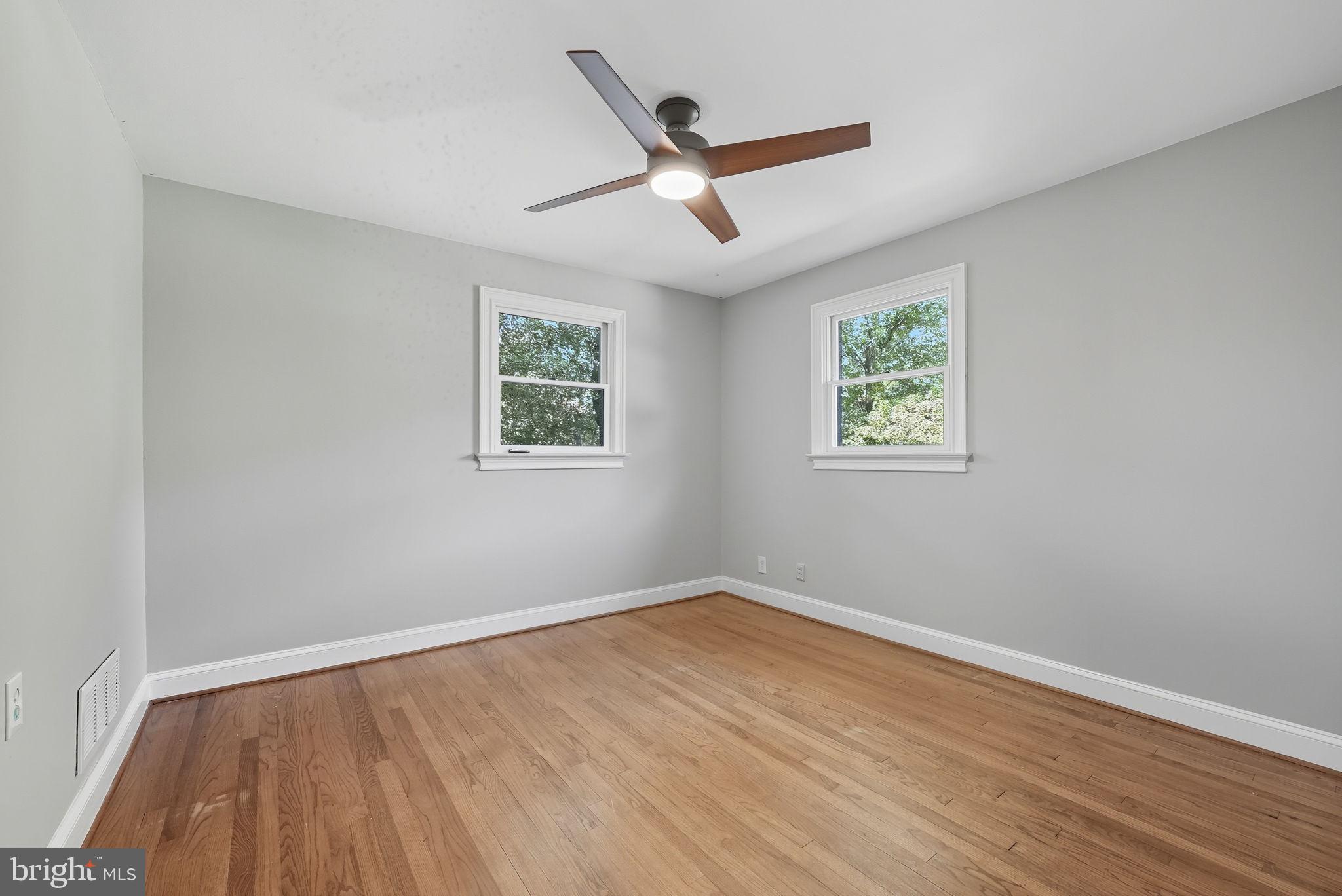 5209 Cedar Road Alexandria, VA 22309 - Photo 15 of 42 a view of empty room with wooden floor and fan