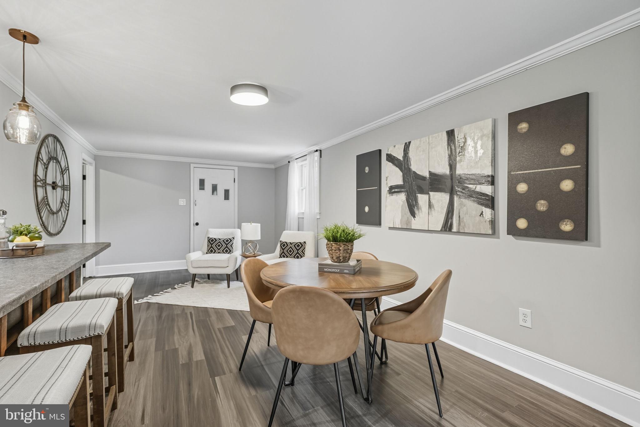 5209 Cedar Road Alexandria, VA 22309 - Photo 25 of 42 a view of a dining room with furniture and wooden floor