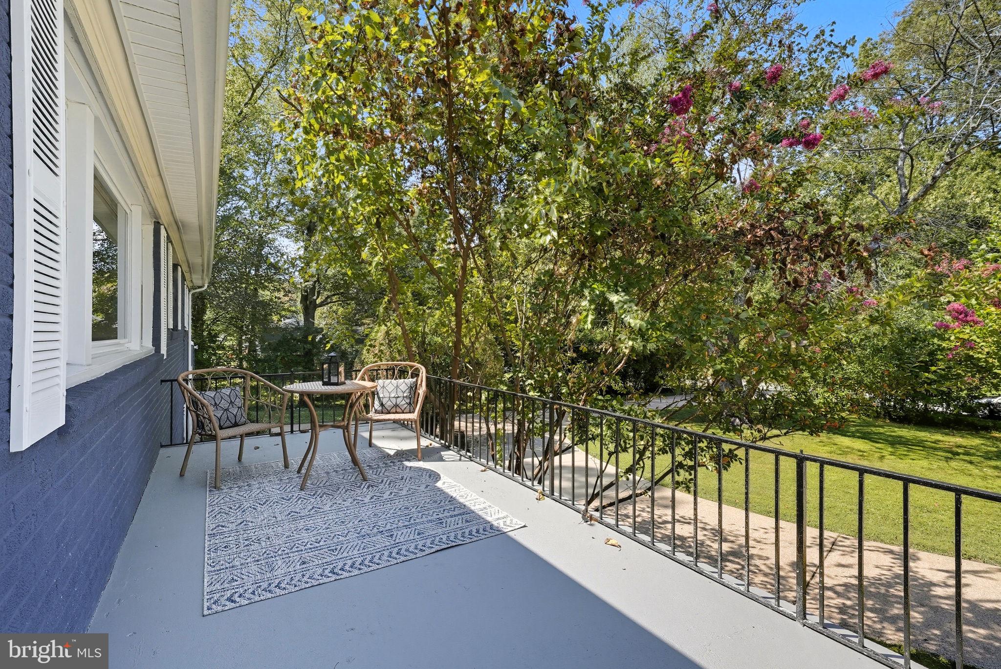 5209 Cedar Road Alexandria, VA 22309 - Photo 5 of 42 a view of a bench in the balcony