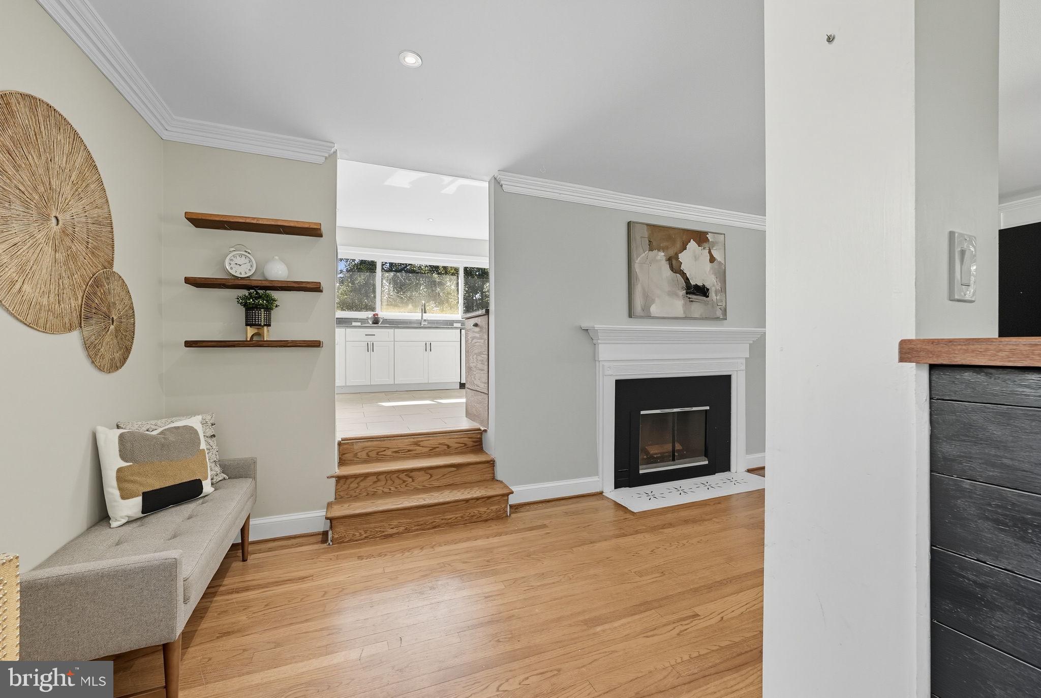 5209 Cedar Road Alexandria, VA 22309 - Photo 9 of 42 a view of a livingroom with furniture and a fireplace