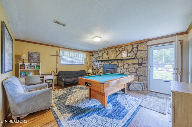 a living room with furniture and a table
