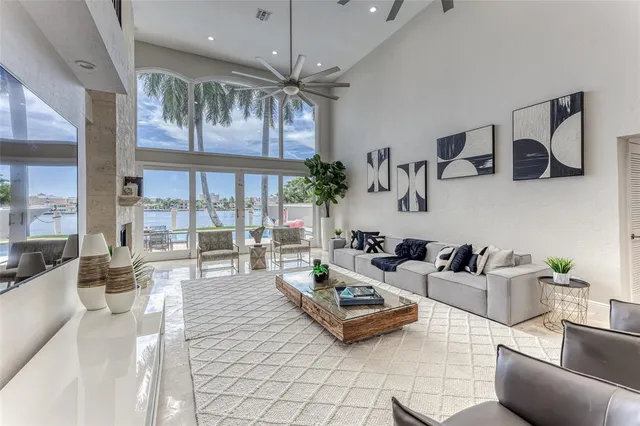 a large kitchen with stainless steel appliances granite countertop a stove and a sink