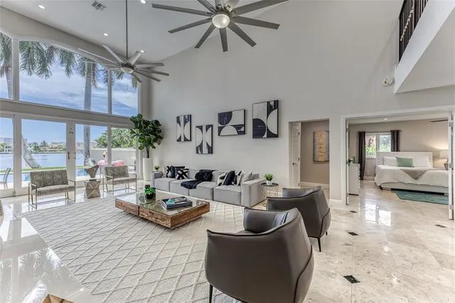 a kitchen with a sink a stove a microwave and cabinets