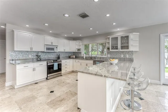 a bedroom with a bed and a chair