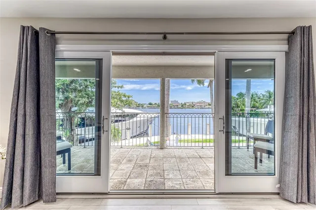 a bathroom with a sink a toilet a shower and a mirror