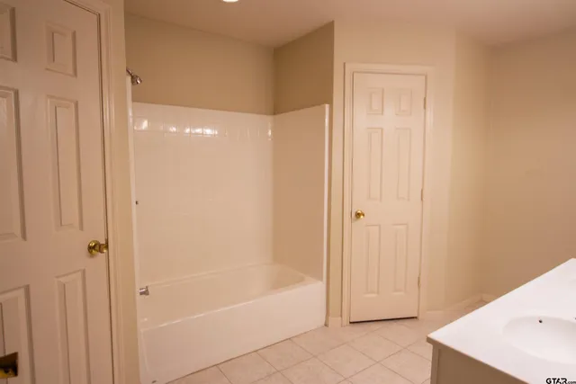 a bathroom with a bathtub