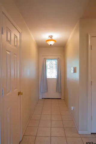 a view of empty room with windows