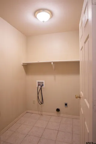 a view of a room with rack on the wall