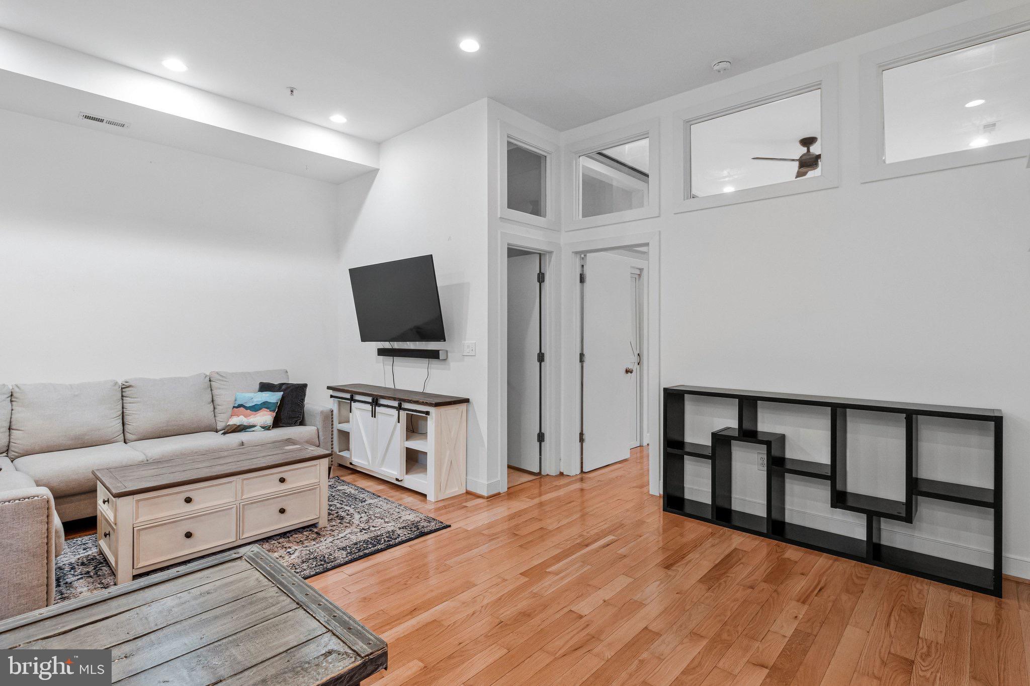 1240 4th Street Northwest, Unit T Washington, DC 20001 - Photo 11 of 28 Modern living space with warm wood accents.