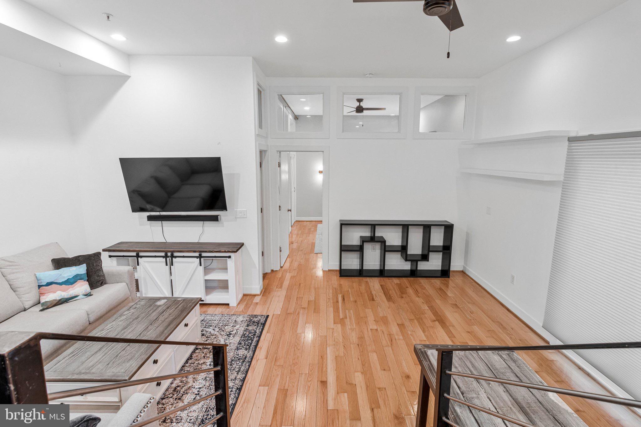 1240 4th Street Northwest, Unit T Washington, DC 20001 - Photo 15 of 28 Modern open space with warm wood floors.
