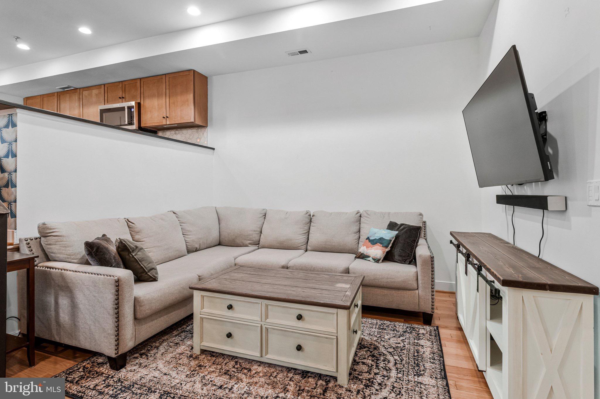 1240 4th Street Northwest, Unit T Washington, DC 20001 - Photo 10 of 28 Living Room with TV