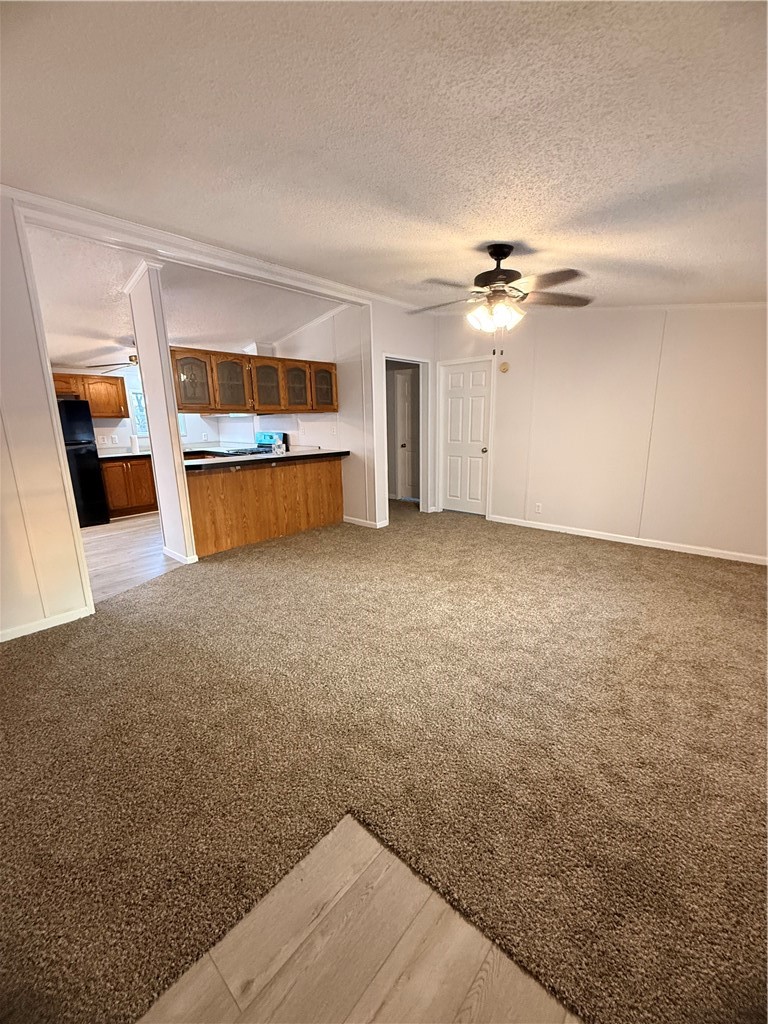 307 West 7th Street St. Elmo, IL 62458 - Photo 7 of 17 wooden floor in an empty room with a window