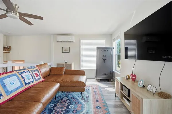 a living room with furniture and a couch