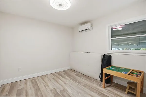 a room with furniture and a window