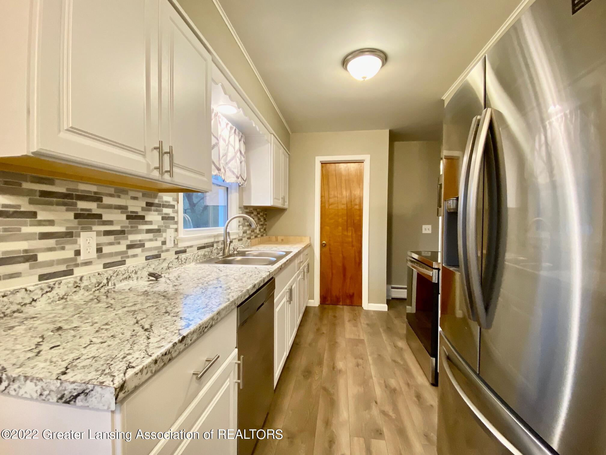 5596 Shoeman Road Haslett, MI 48840 - Photo 9 of 37 refrigerator