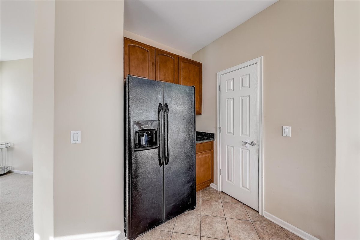 406 Aviary Lane Bolingbrook, IL 60490 - Photo 13 of 46 a view of a kitchen from the hallway