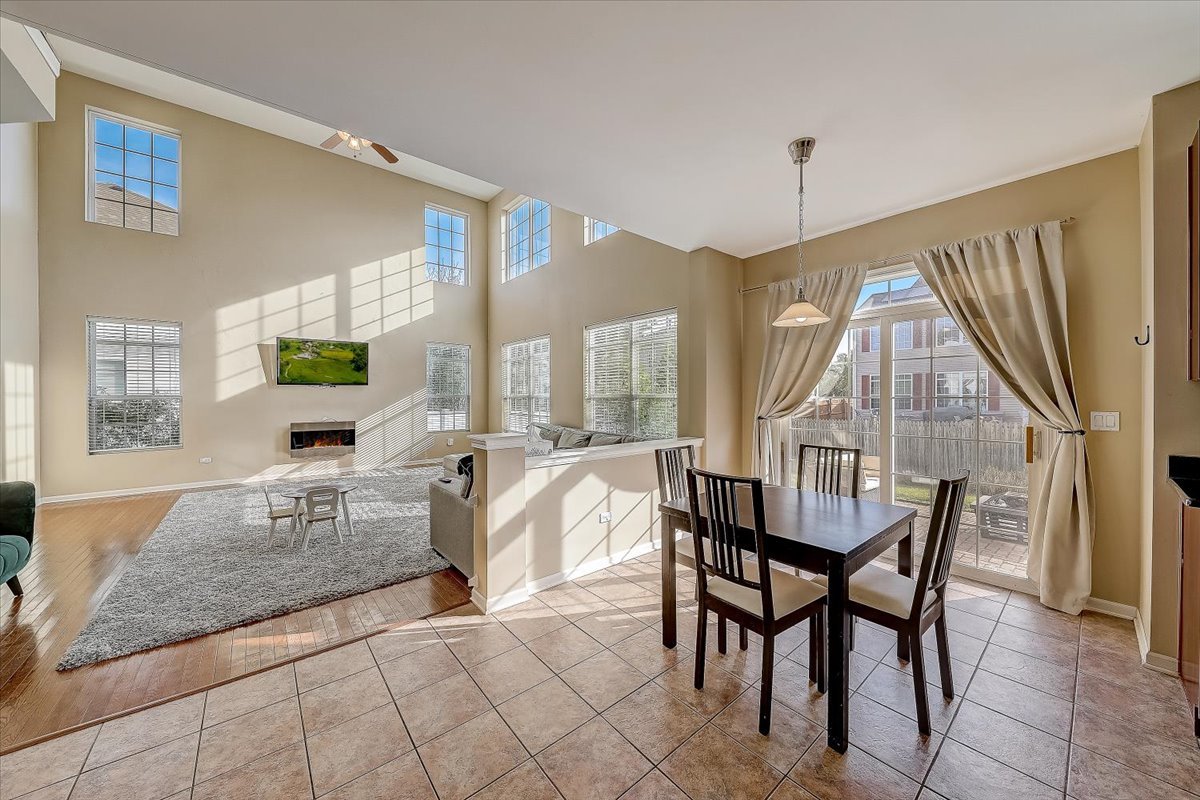 406 Aviary Lane Bolingbrook, IL 60490 - Photo 16 of 46 a dining room with furniture and window