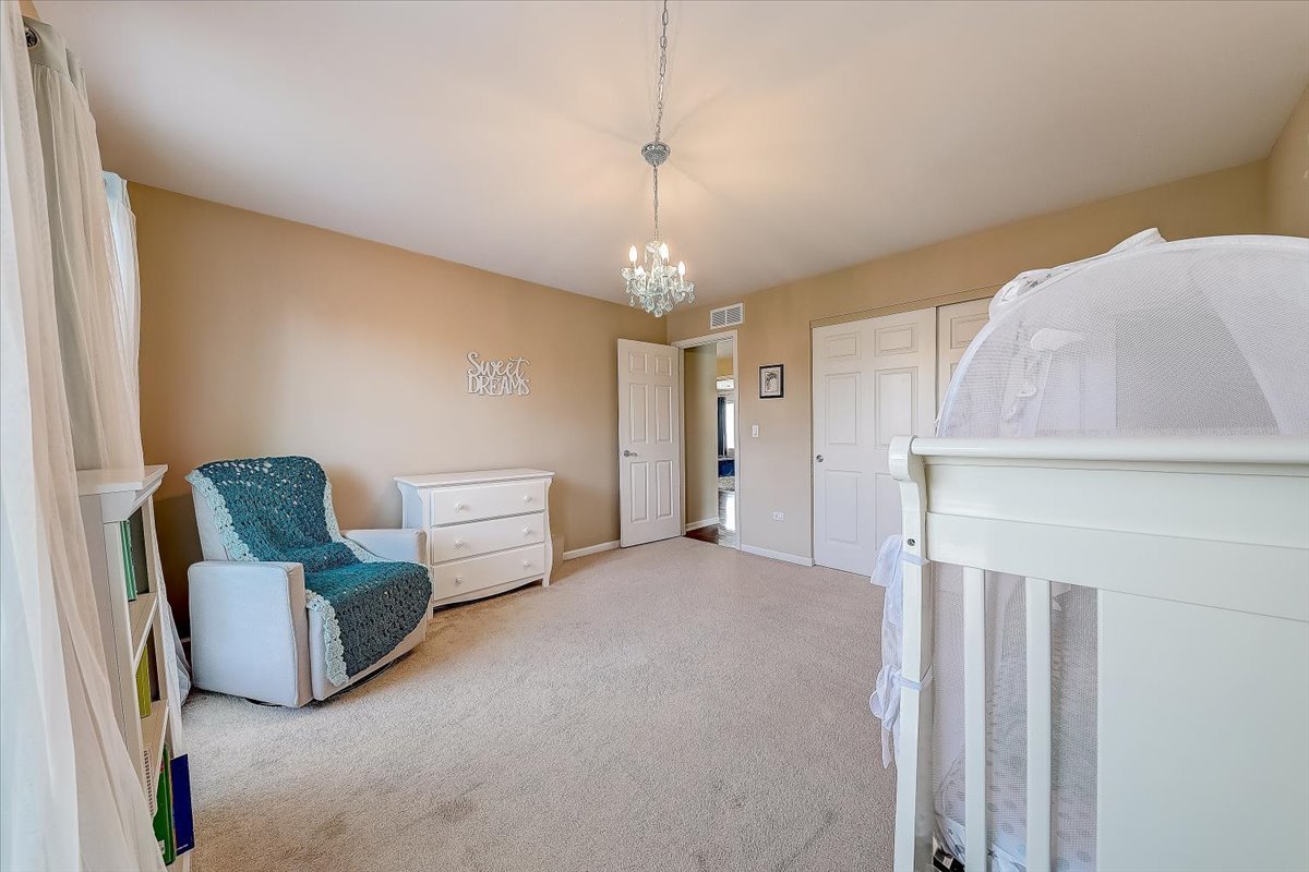 406 Aviary Lane Bolingbrook, IL 60490 - Photo 33 of 46 a view of livingroom with furniture and white walls