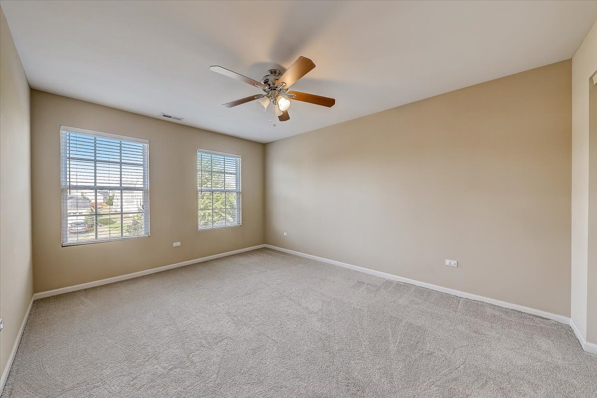 406 Aviary Lane Bolingbrook, IL 60490 - Photo 34 of 46 a view of an empty room with a window