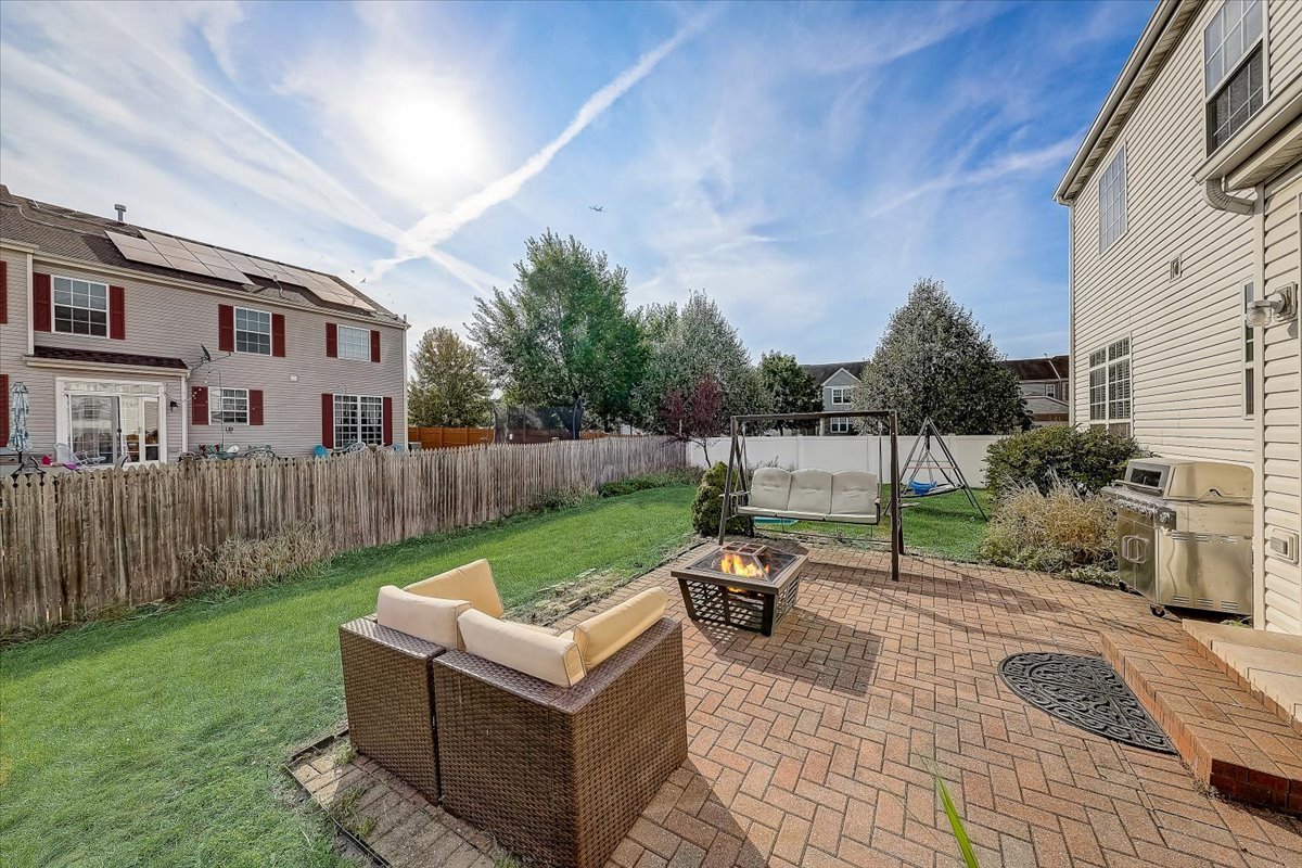 406 Aviary Lane Bolingbrook, IL 60490 - Photo 41 of 46 a view of backyard of house with seating space