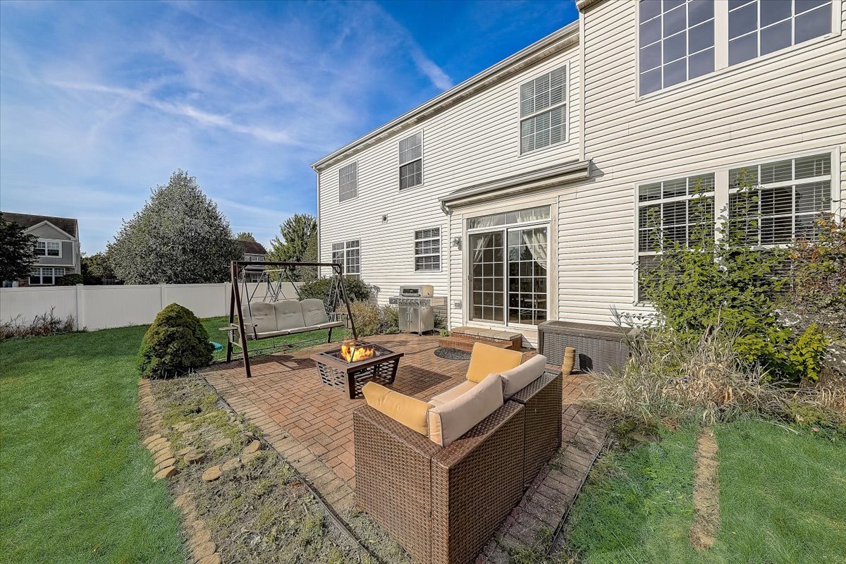 406 Aviary Lane Bolingbrook, IL 60490 - Photo 42 of 46 a view of a house with backyard and sitting area