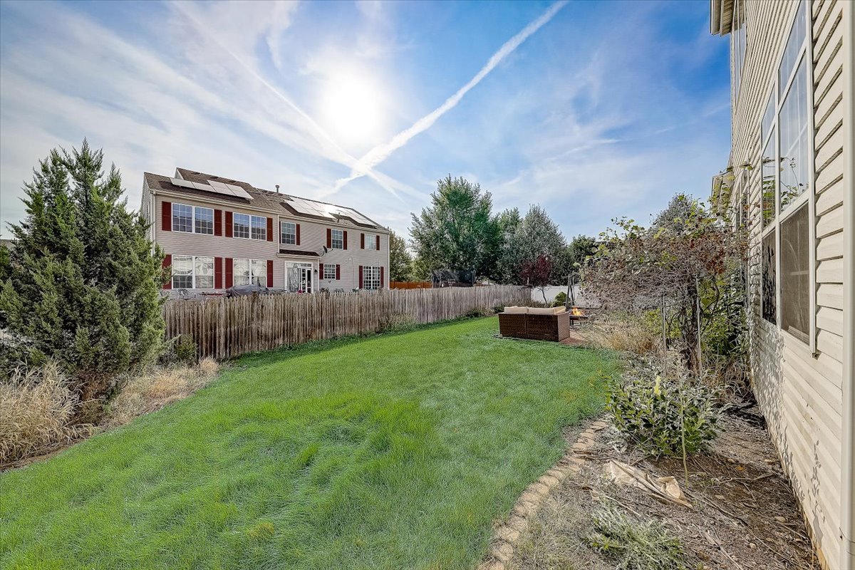406 Aviary Lane Bolingbrook, IL 60490 - Photo 45 of 46 a front view of a house with garden