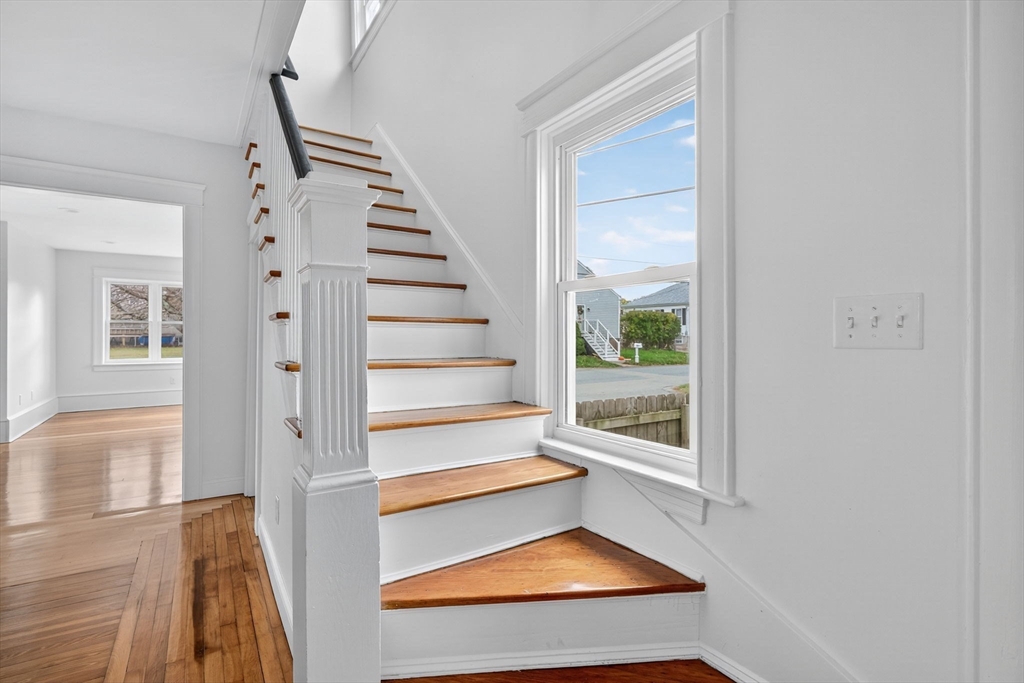 228 Dickinson Street Fall River, MA 02721 - Photo 19 of 40 a view of entryway with wooden floor and front door