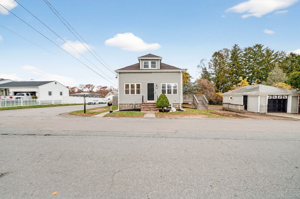 228 Dickinson Street Fall River, MA 02721 - Photo 2 of 40 a building with trees in front of it