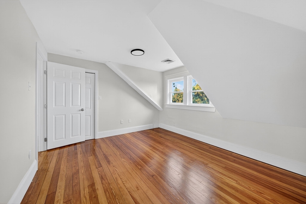 228 Dickinson Street Fall River, MA 02721 - Photo 24 of 40 wooden floor in an empty room with a window