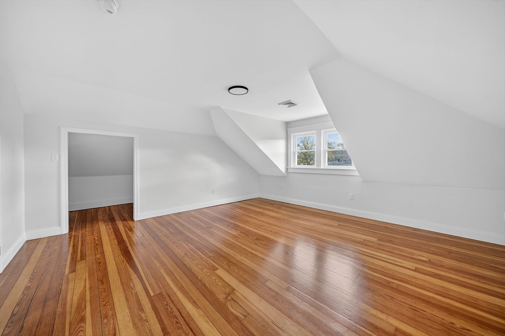 228 Dickinson Street Fall River, MA 02721 - Photo 26 of 40 a view of empty room with wooden floor