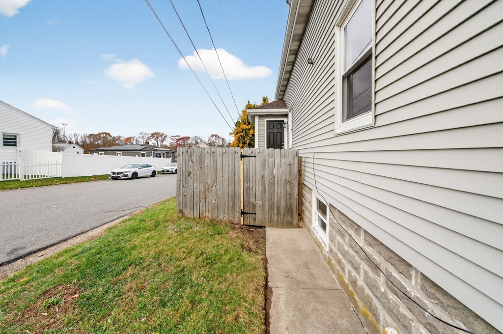 228 Dickinson Street Fall River, MA 02721 - Photo 29 of 40 a view of a terrace with a garden