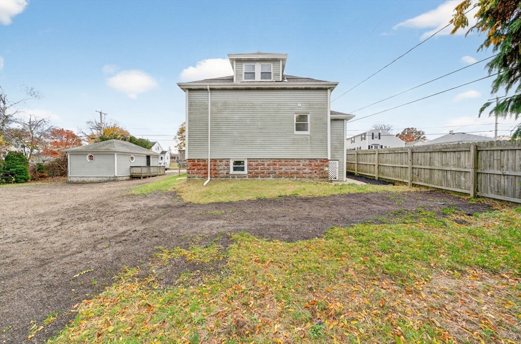 228 Dickinson Street Fall River, MA 02721 - Photo 32 of 40 a view of a house with backyard and sitting area