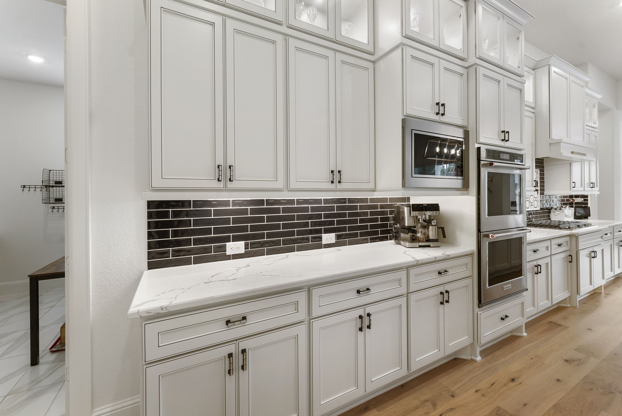 12932 Whitewater Way Conroe, TX 77302 - Photo 12 of 48 Double ovens and a dedicated coffee bar. Fresh baked cookies!