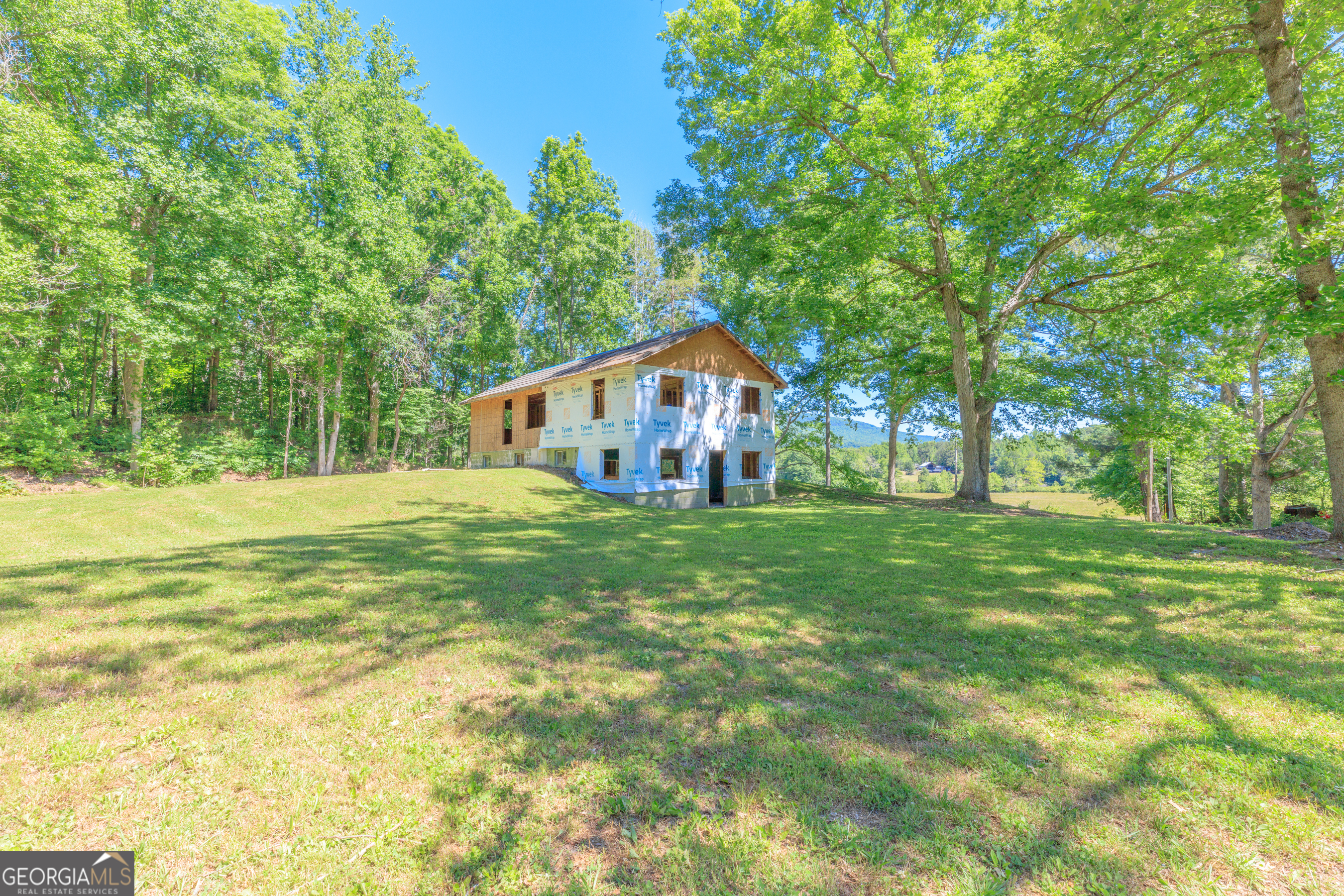 1004 Crow Gap Road Chickamauga, GA 30707 - Photo 28 of 36 a house view with a garden space