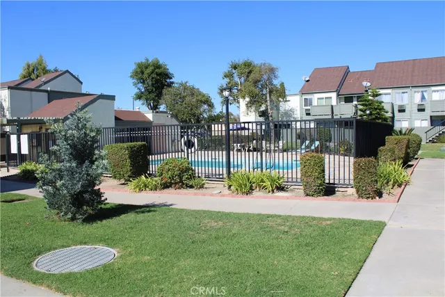 a view of a workspace with furniture
