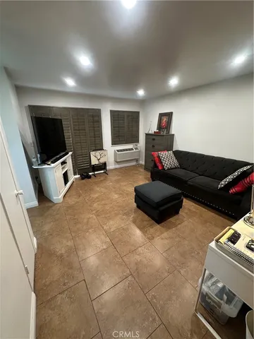 a kitchen with a sink a stove and a refrigerator