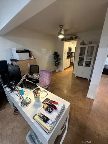 a kitchen with stainless steel appliances a refrigerator and a stove