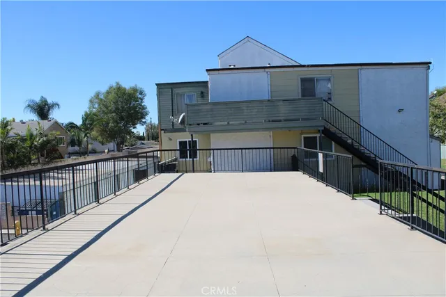 a house view with a outdoor space