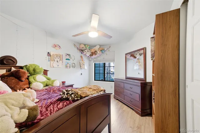 a bed room with a bed and a dresser