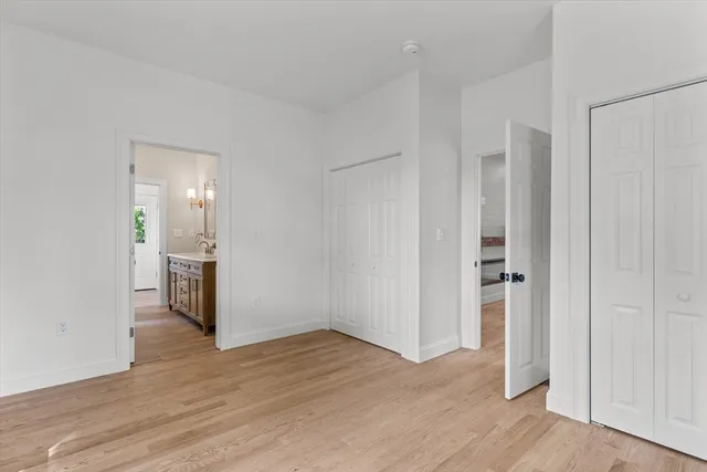 a view of a livingroom with wooden floor