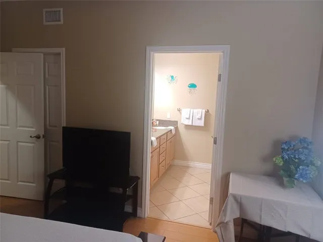 a bathroom with a sink and mirror