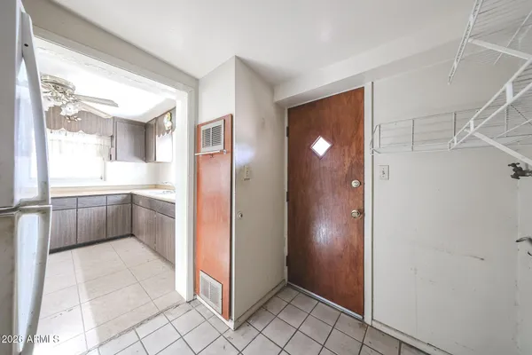 a bathroom with a shower and a sink