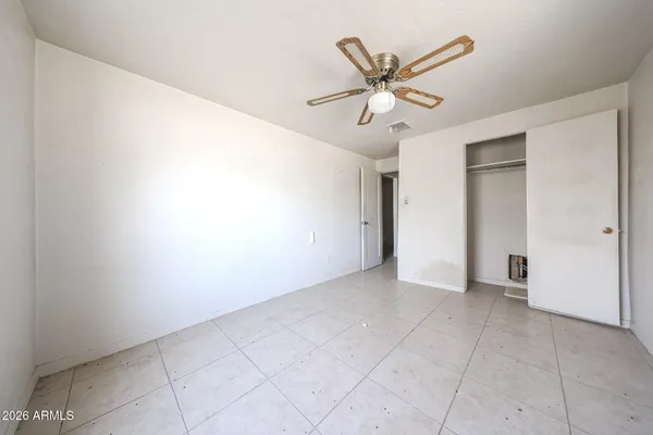 a view of a kitchen from the hallway