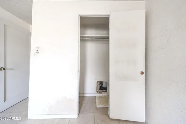 a view of a bathroom with mirror