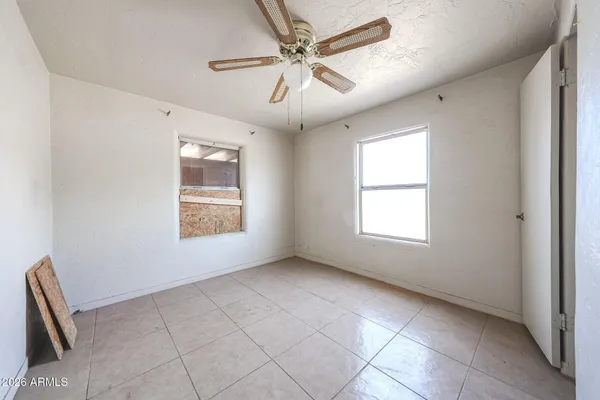 a view of an empty room and window