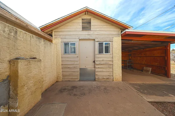 a view of a pathway with a balcony