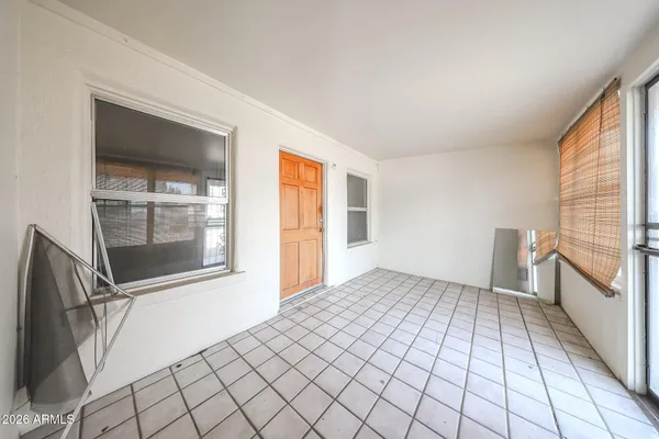 a view of an empty room and window