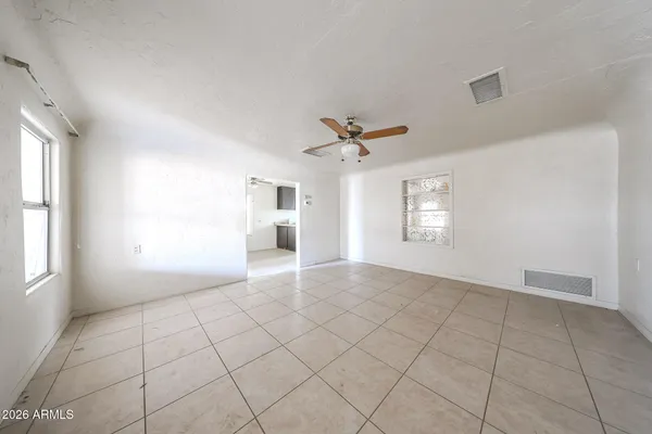 a view of an empty room with a window