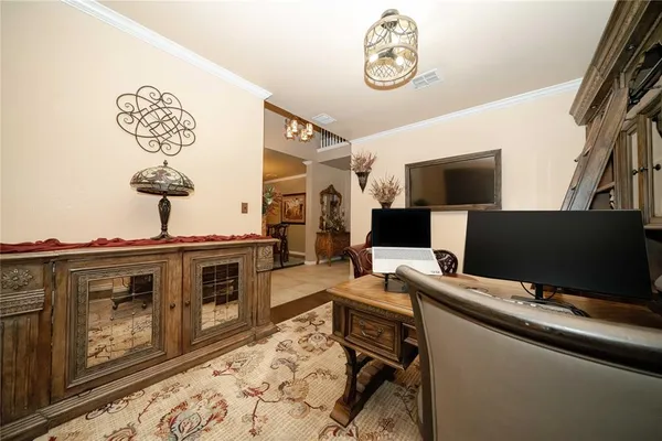 a view of a workspace with furniture